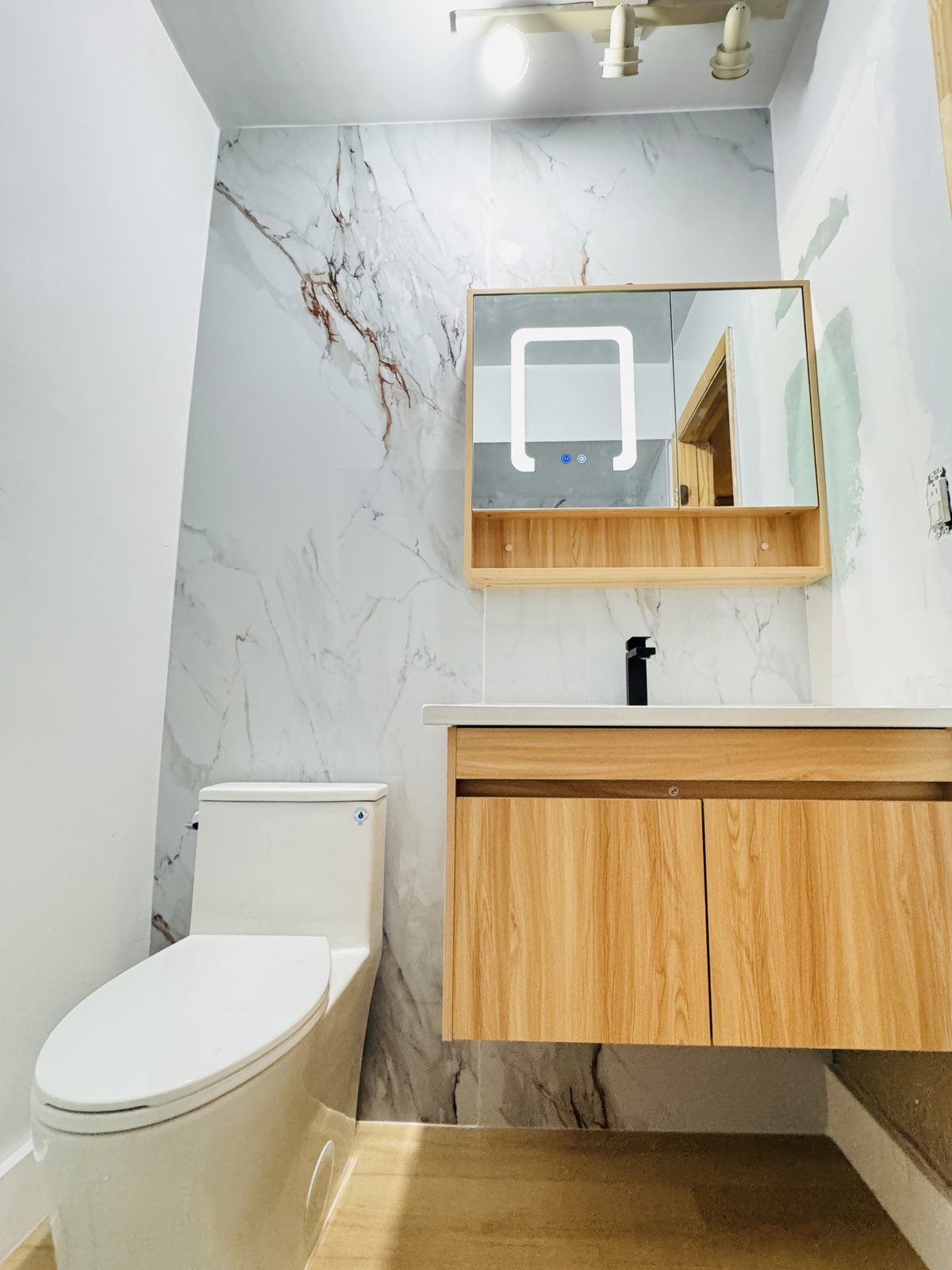 Floating vanity, backlit mirror